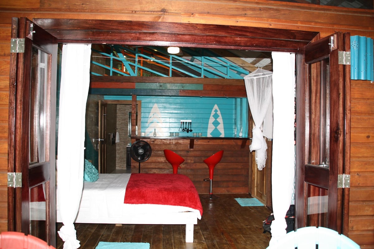 Bedroom interior in Bungalow Left at SurfBreak at Paunch